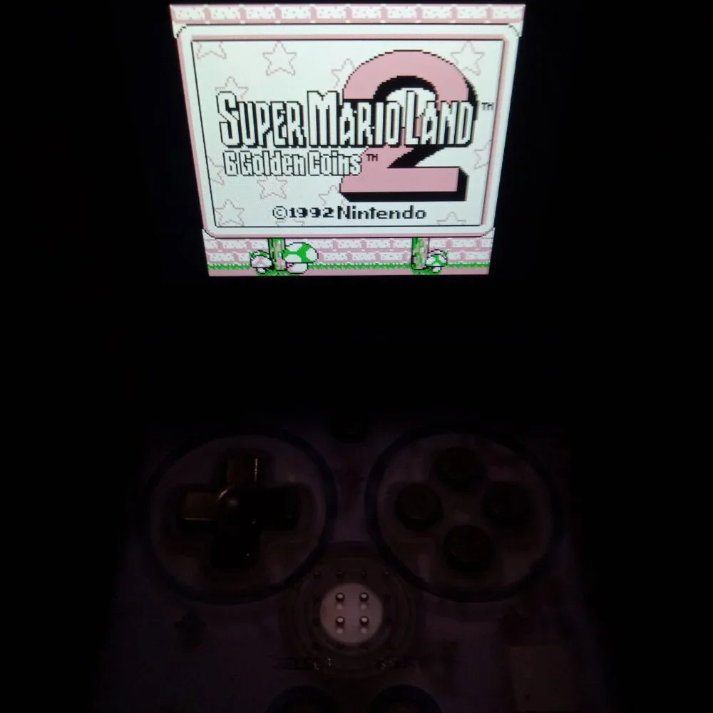 Pre-Loaded Anbernic RG35XXSP blue transparent with most retro platforms 64gb